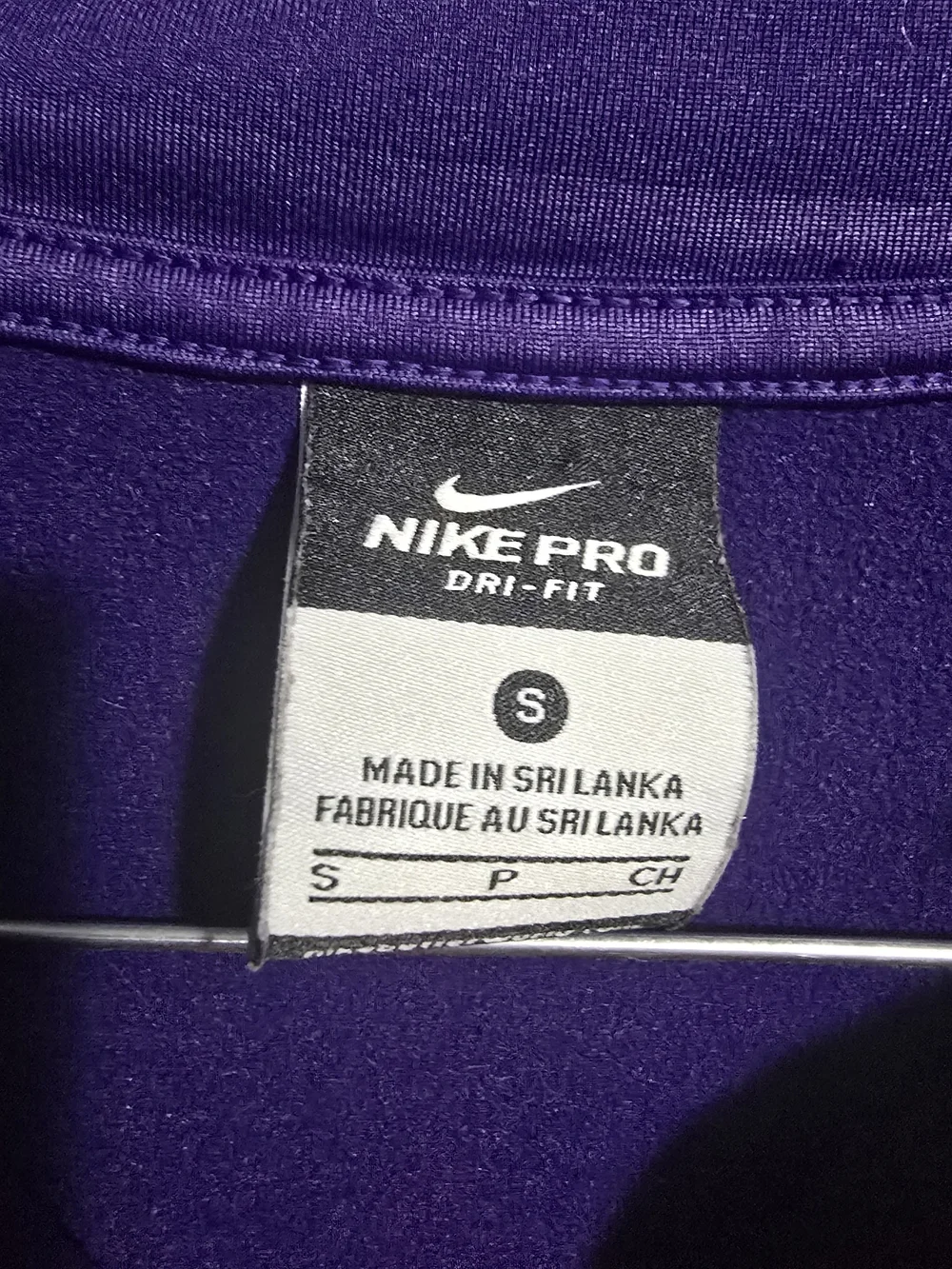 Nike Women's Purple Quarter-Zip Athletic Top with Orange Trim